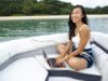 Women working online on boat